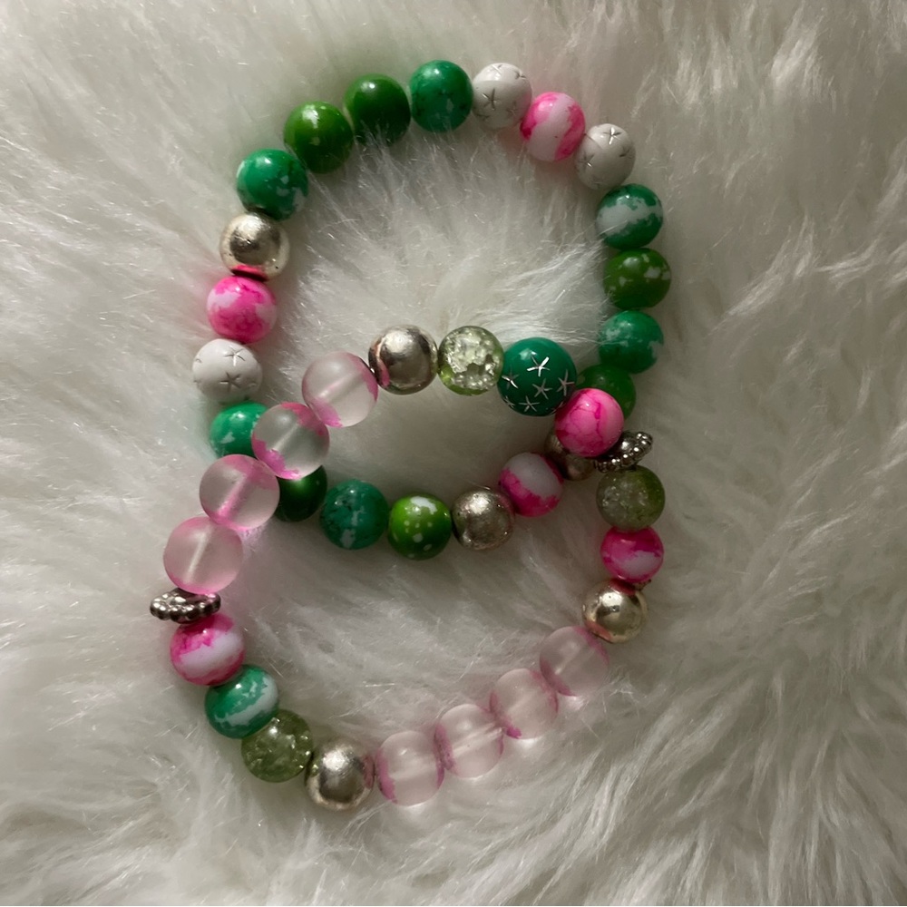 ***SOLD**** 
Pink and Green Custom made bracelets.